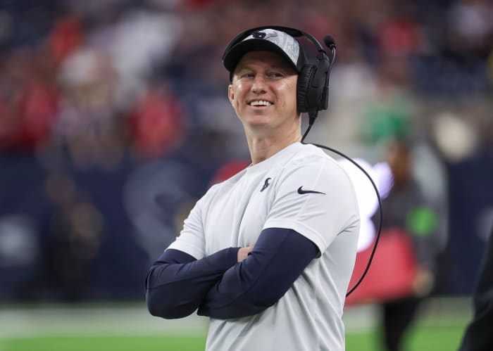 Texans offensive coordinator Bobby Slowik smiles before the game against the Cleveland Browns at NRG Stadium.